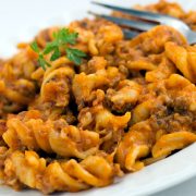 Spiral pasta with ground beef in a tomato cheese sauce