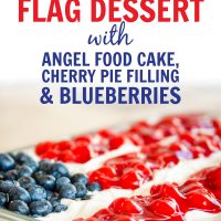 Fluffy white whipped cream mix over crumbled angel food cake topped with blueberies and cherry pie filling in the design of an American flag in a 9x12 glass pan; text 4th of July Flag Dessert with Angel Food Cake, Cherry Pie Filling & Blueberries - Add Salt & Serve logo
