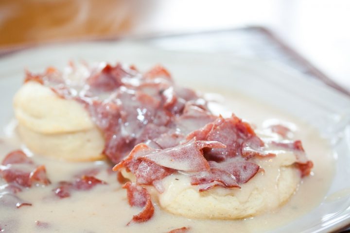 Chipped Beef Gravy and Biscuits on a white plate