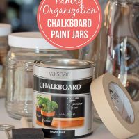 Chalkboard paint & supplies with glass jars, text Pantry Organization: Chalkboard Paint