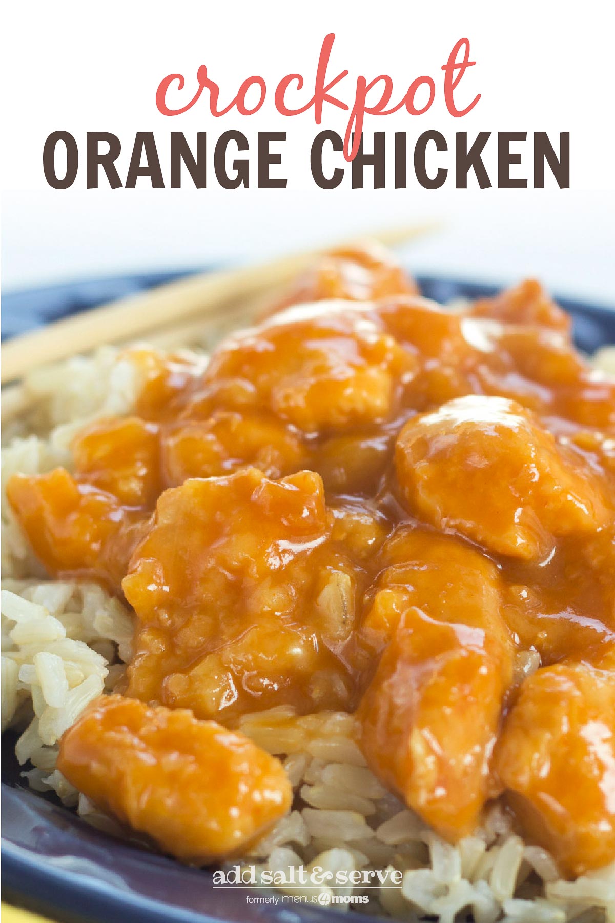 Crockpot Orange Chicken on a bed of rice with chopsticks