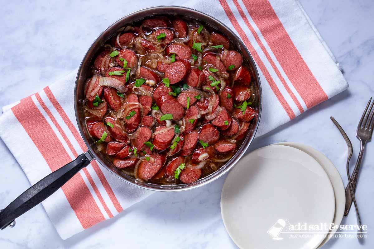 Cooked brown sugar kielbasa in a skillet.