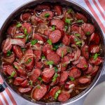 Cooked brown sugar kielbasa in a skillet.