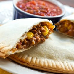 Corn and ground beef empanadas with salsa