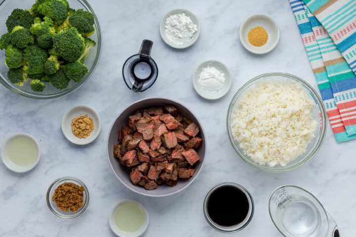 ingredients for Beef and Broccoli: leftover steak, soy sauce, broccoli, rice, garlic powder, oil, salt, pepper, brown sugar, ground ginger