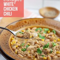 Crockpot White Chicken Chili Garnished with Cilantro - Add Salt & Serve