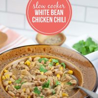 Slow Cooker White Bean Chicken Chili Garnished with Cilantro - Add Salt & Serve