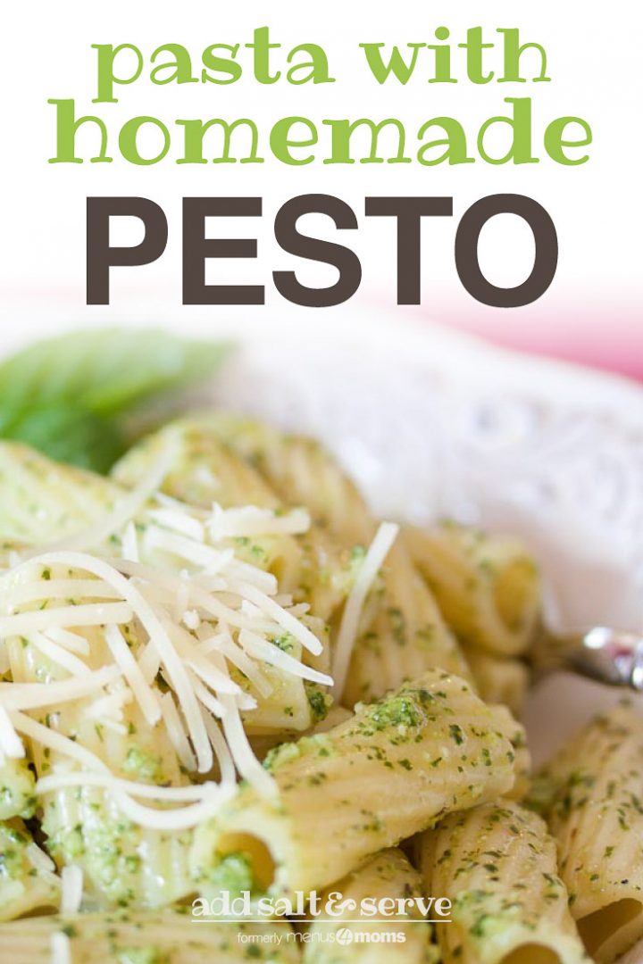 Rigatoni on a white plate topped with shredded parmesan cheese and pesto. Text Pasta with Homemade Pesto Add Salt & Serve formerly menus4moms