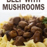 White plate with egg noodles topped with beef and mushrooms, garnished with a sprig of parsley; text slow cooker beef with mushrooms add salt & serve formerly menus4moms