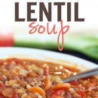 Soup with barley, lentils, carrots, tomatoes, and broth in a white bowl with text Barley Lentil Soup Add Salt & Serve formerly Menus4Moms