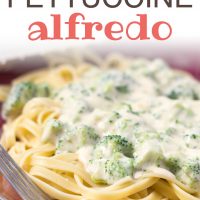 Afredo sauce with broccoli over fettuccine on a clear glass plate with a fork; Broccoli & Fettuccine Alfredo Add Salt & Serve formerly Menus4Moms