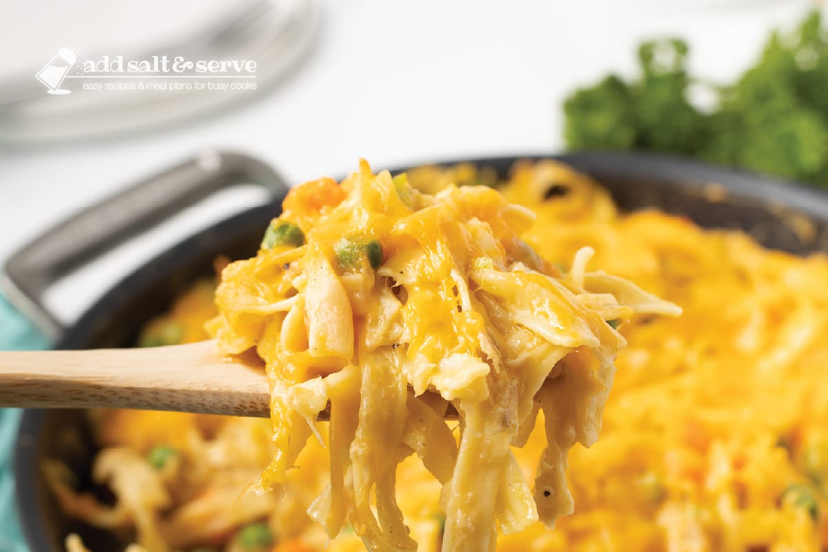 spoonful of cheesy tuna casserole.