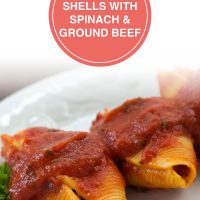 White plate with 3 jumbo pasta shells stuffed with beef and covered with spaghetti sauce, garnished with parsley; text Stuffed Shells with Spinach & Ground Beef - Add Salt & Serve logo