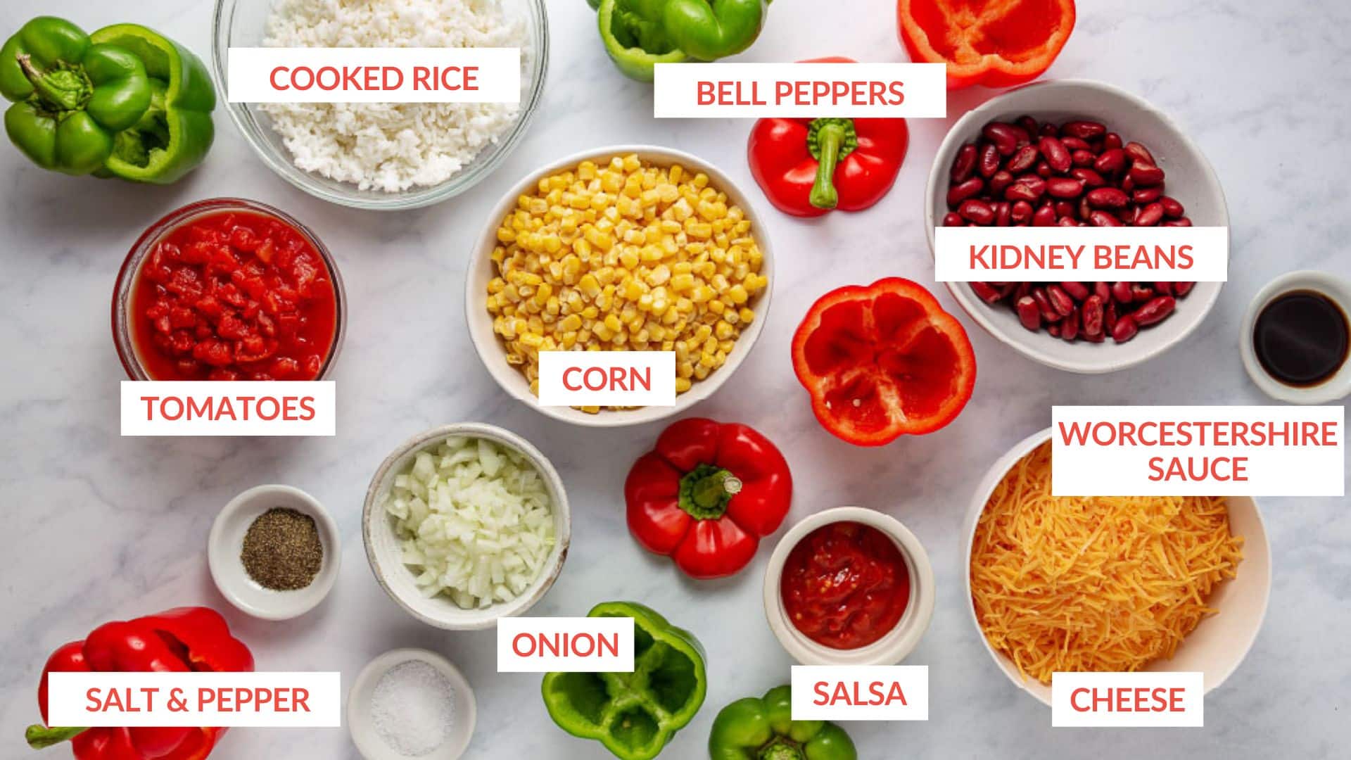 Ingredients for Vegetarian Stuffed Peppers: bell peppers, rice, corn, onion, kidney beans, salsa, cheese,, salt, pepper, and Worcestershire sauce.  