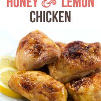 Four pieces of baked chicken on a white plate with lemon slices; text Baked Honey & Lemon Chicken - Add Salt & Serve logo