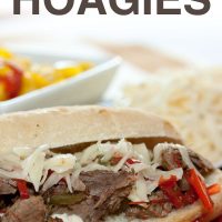 A hoagie roll on a red plate with shredded roast beef, onions, and bell peppers, with a white bowl of pickled peppers in the background; text Italian Beef Hoagies Add Salt & Serve formerly Menus4Moms