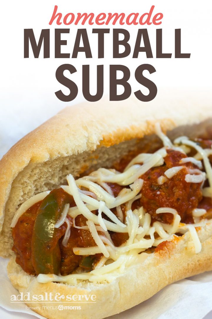 Meatballs, sauce, shredded mozarrella cheese, and strips of bell peppers on a hot dog bun, all on a white plate.