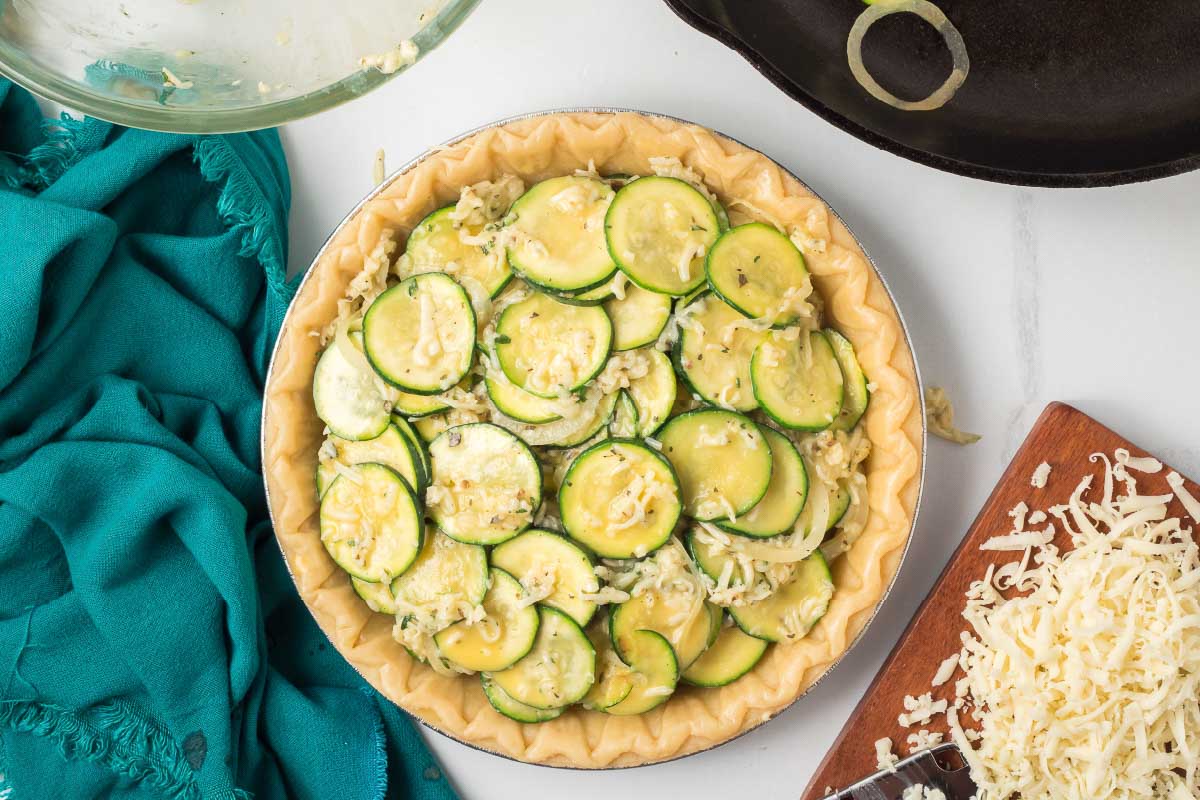 Sautéed zucchini and onion mixed with herbs and egg in a pie crust.