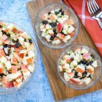 Overhead view of three bowls of Apple Raisin Salad