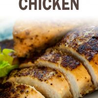 Sliced chicken breast on a white plate; text baked skillet chicken add salt & serve formerly menus4moms