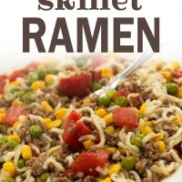 Ground beef, corn, peas, diced tomotoes, and ramen noodles on a white plate; text easy skillet ramen add salt & serve formerly menus4moms