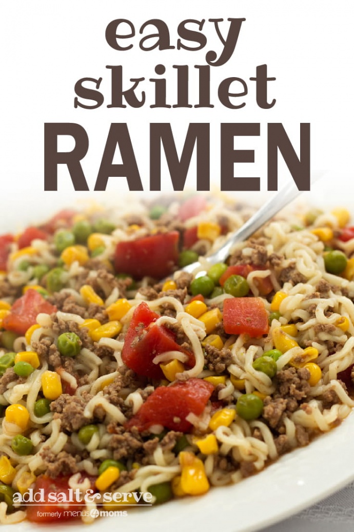 Ground beef, corn, peas, diced tomotoes, and ramen noodles on a white plate; text easy skillet ramen add salt & serve formerly menus4moms