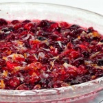 Baked cranberry sauce with bits of orange and coconut