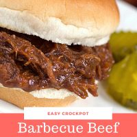 Barbecue Roast Beef Sandwich garnished with two pickle slices.