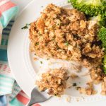 A plate of Crockpot Chicken and Stuffing with broccoli on the side.