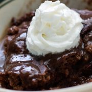 Homemade Hot Fudge Cake topped with whipped cream