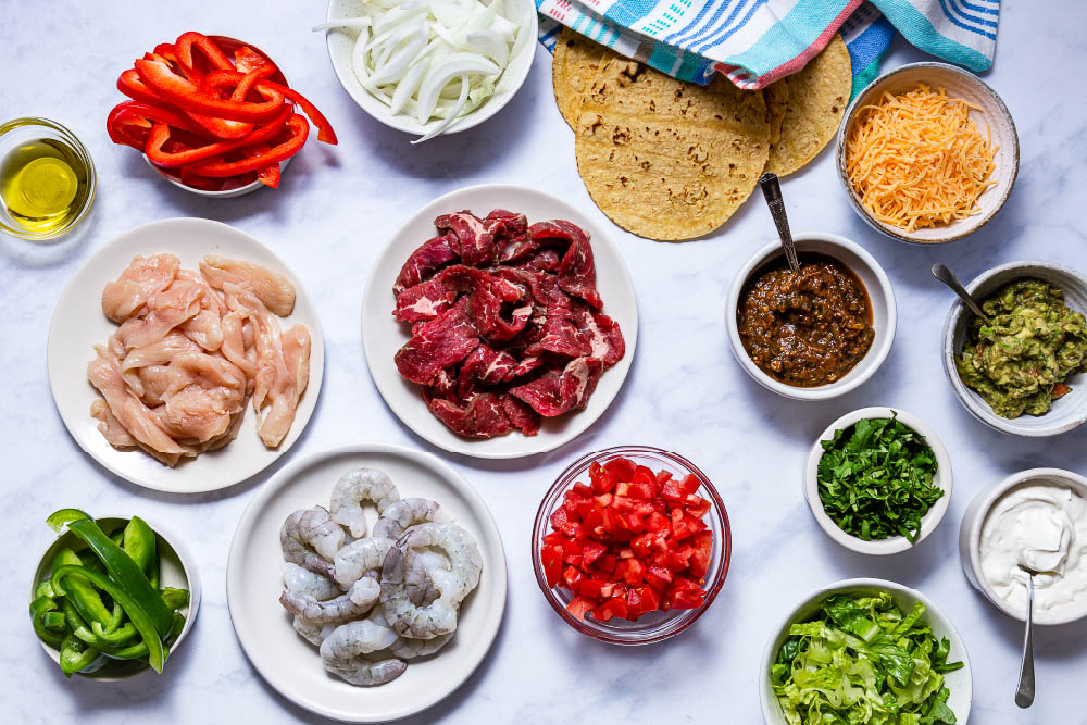 overhead view of ingredients for fajitas texanas