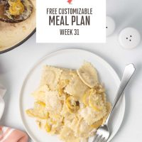 Plate of Cheese Ravioli with Summer Squash with a creamy sauce beside a Dutch oven filled with the cooked dish and surrounded by salt and pepper shakers and sprigs of parsley and text Free Customizable meal Plan Week 31.