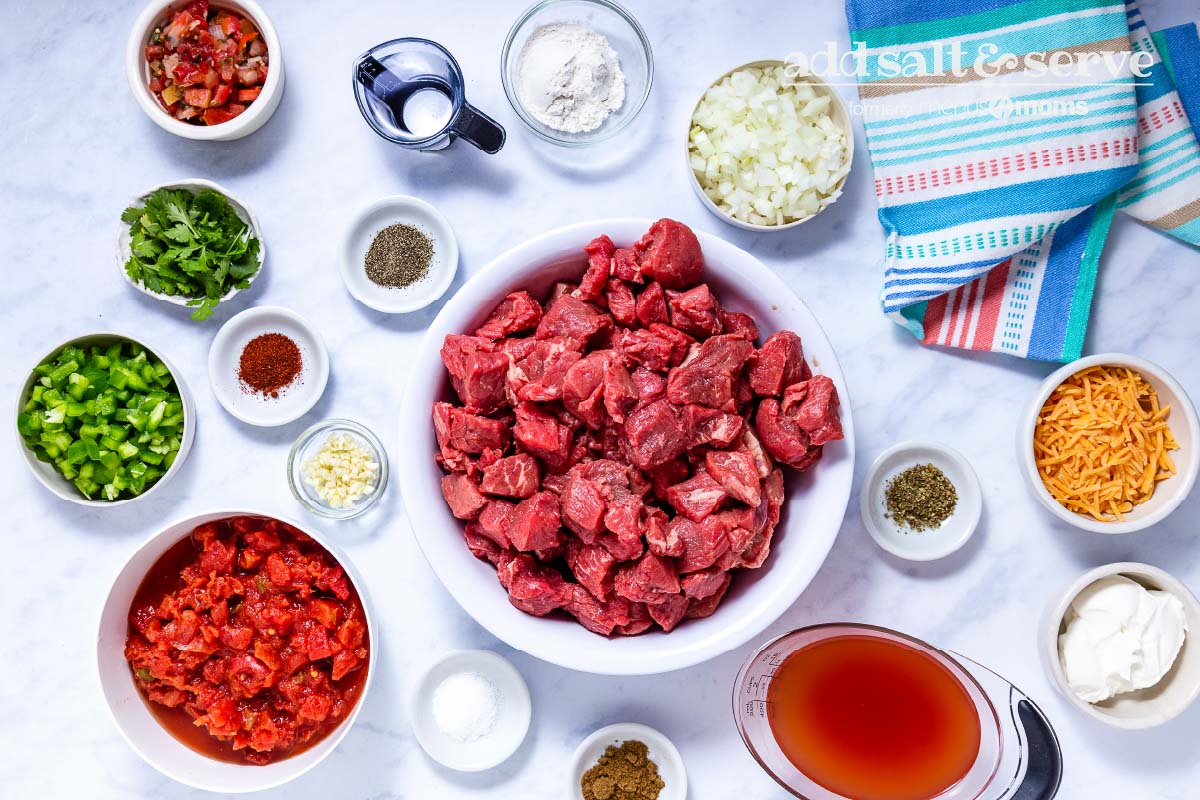 Overhead view of ingredients for Carne Guisada Crock Pot.