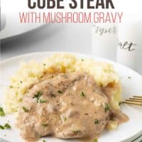 Cube steak with mushroom soup gravy served over mashed potatoes.