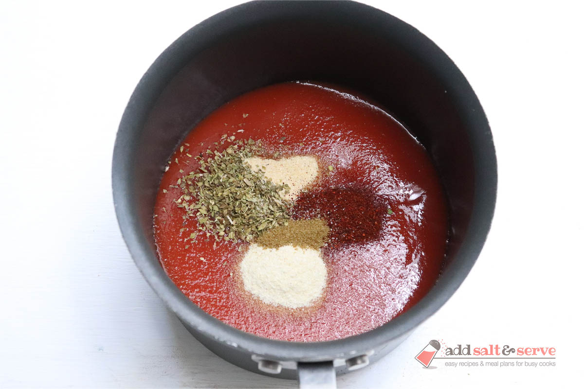 Ingredients for mojado sause in a sauce pan before mixing.