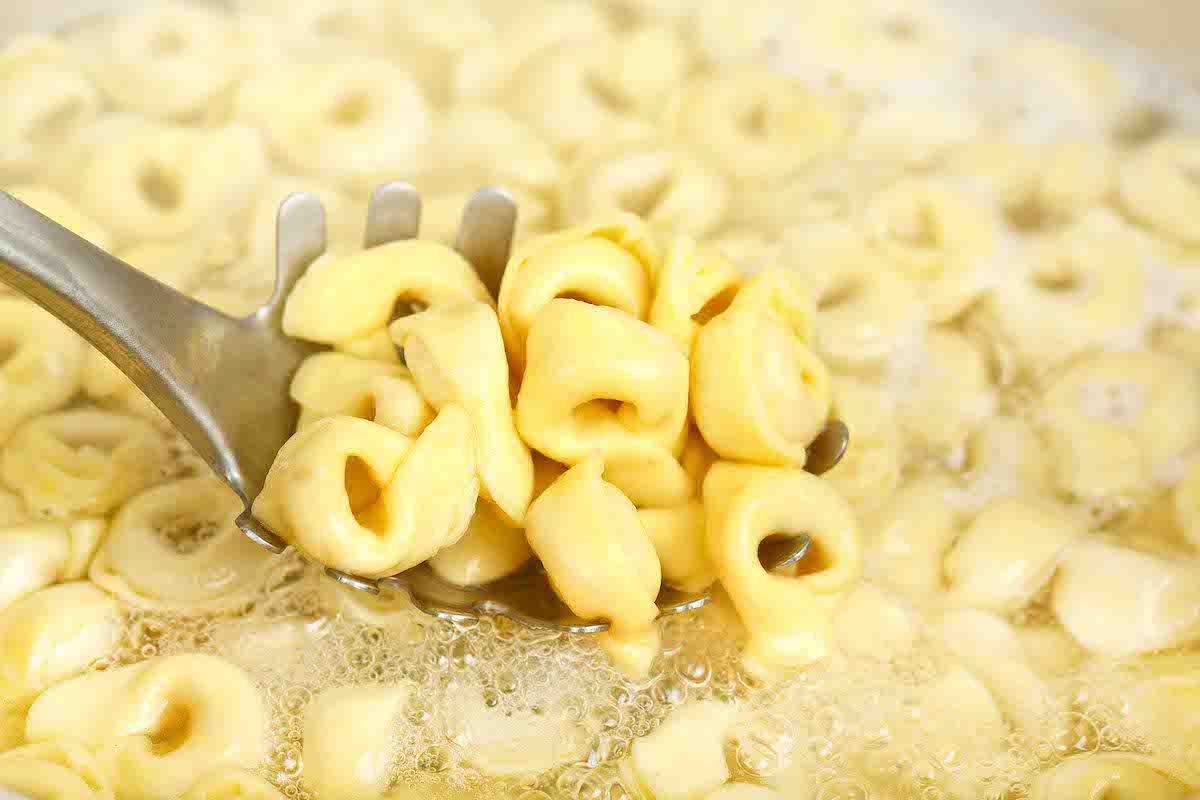 Tortellini in boiling water.