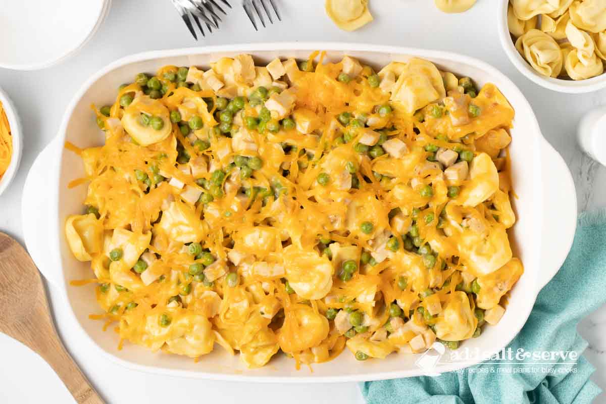 Tortellini, turkey, and peas in a cheesy casserole.