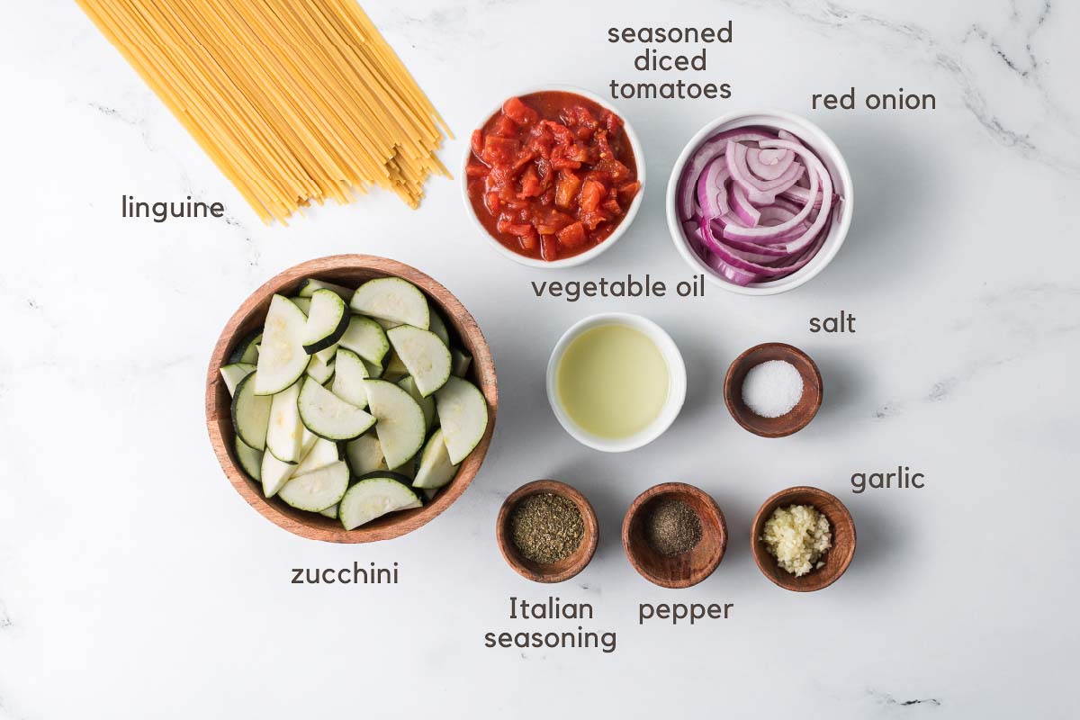 Ingredients for zucchini linguine in prep bowls.