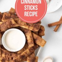 Baked cinnamon sticks encrusted with cinnamon sugar in butter and served with vanilla icing.