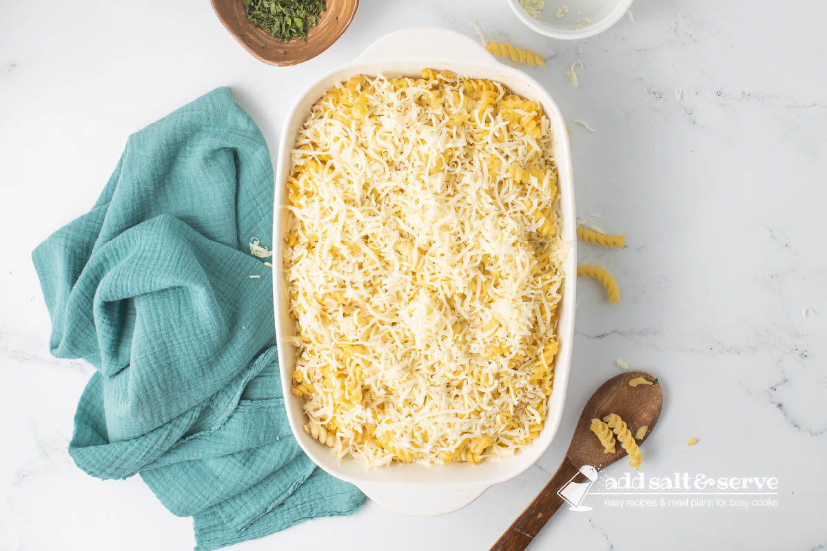 Rotini Pasta Bake after it has been baked for 35 minutes and topped with shredded mozzarella cheese before baking to melt the cheese.