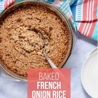 French Onion Rice in a casserole dish with a serving spoon.