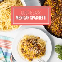 Plate of Mexican Spaghetti topped with shredded cheese on a counter beside a bowl of cooked spaghetti and a pot of Mexican Spaghetti sauce on bottom with text Quick & Easy Mexican Spaghetti.