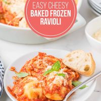 Serving of baked frozen ravioli on a plate beside the casserole dish with text Easy Cheesy Baked Frozen Ravioli.