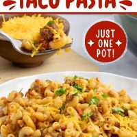 Plate of macaroni, beef, and tomatoes in a cheesy sauce garnished with cilantro and grated cheddar cheese with text Cheesy Taco Pasta - Just One Pot.