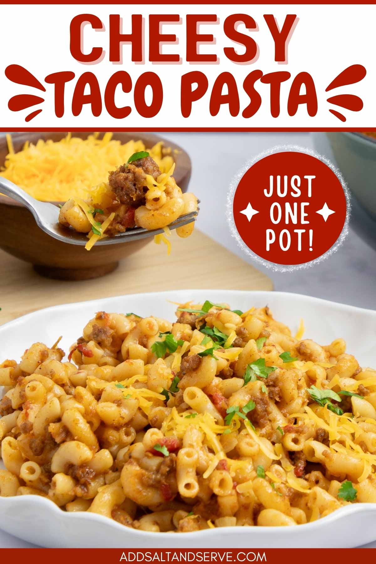 Plate of macaroni, beef, and tomatoes in a cheesy sauce garnished with cilantro and grated cheddar cheese with text Cheesy Taco Pasta - Just One Pot.