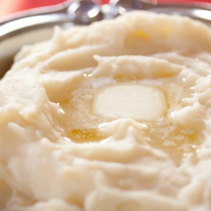 Mashed Potatoes with a pat of melting butter.
