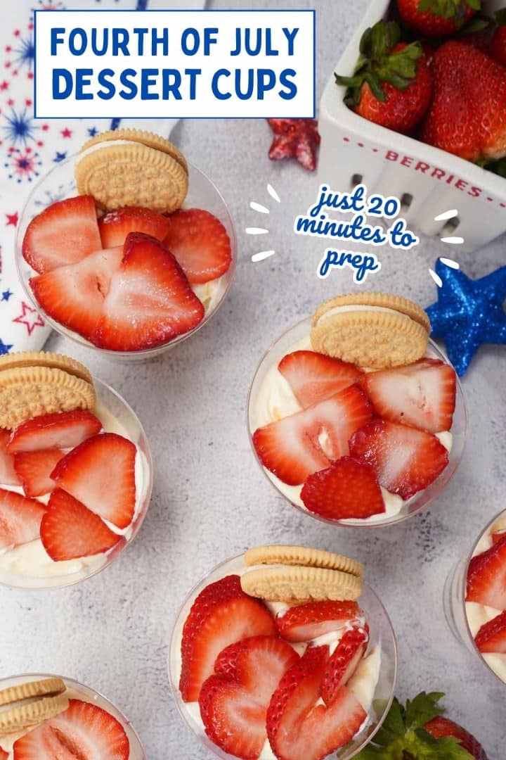 Red, white, and blue parfaits in plastic cups topped with sliced strawberries and a sandwich cookie with text Fourth of July Dessert Cups - just 20 minutes to prep.