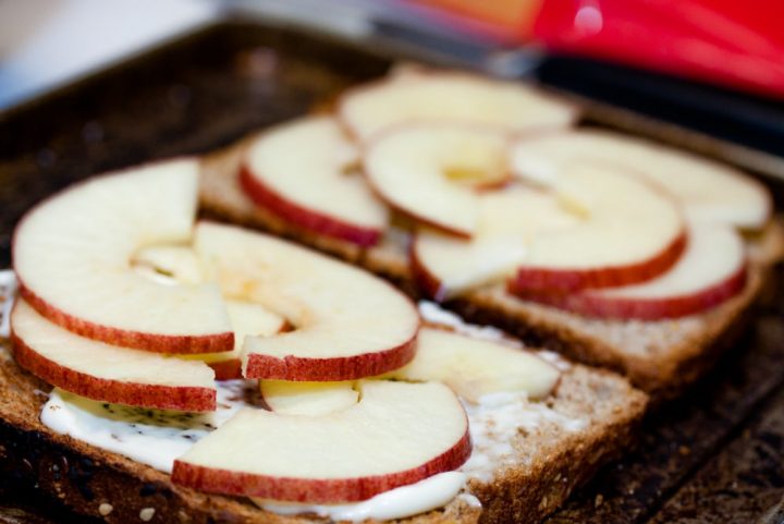 Toast with mayo and sliced apples and text Add Salt & Serve